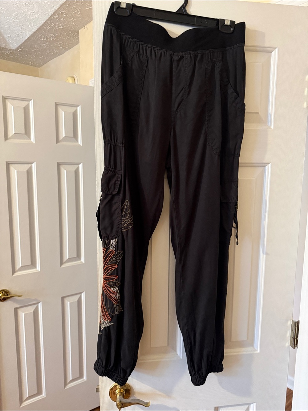 XCVI Black Cargo Joggers with Orange & Cream Floral Stitching